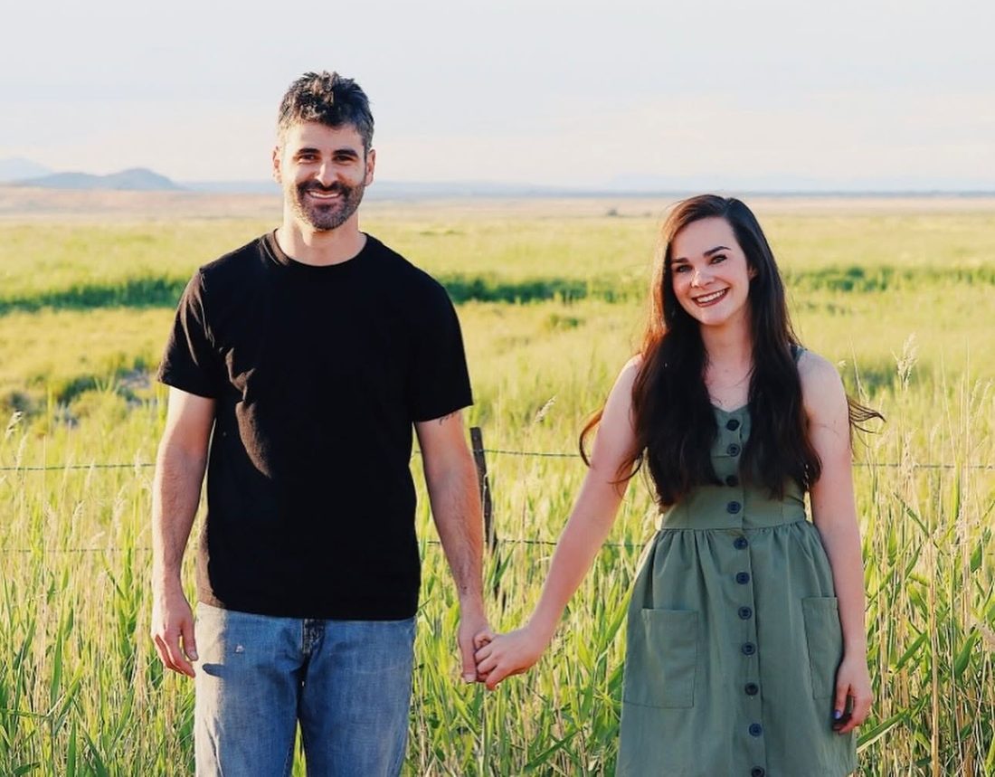 Jenny Bowen and her husband, the couple behind Salty Books, in a Tooele County field